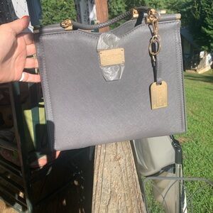 Bebe Black Satchel with Gold Accents